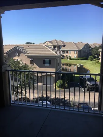 a front view of a house with a ocean view