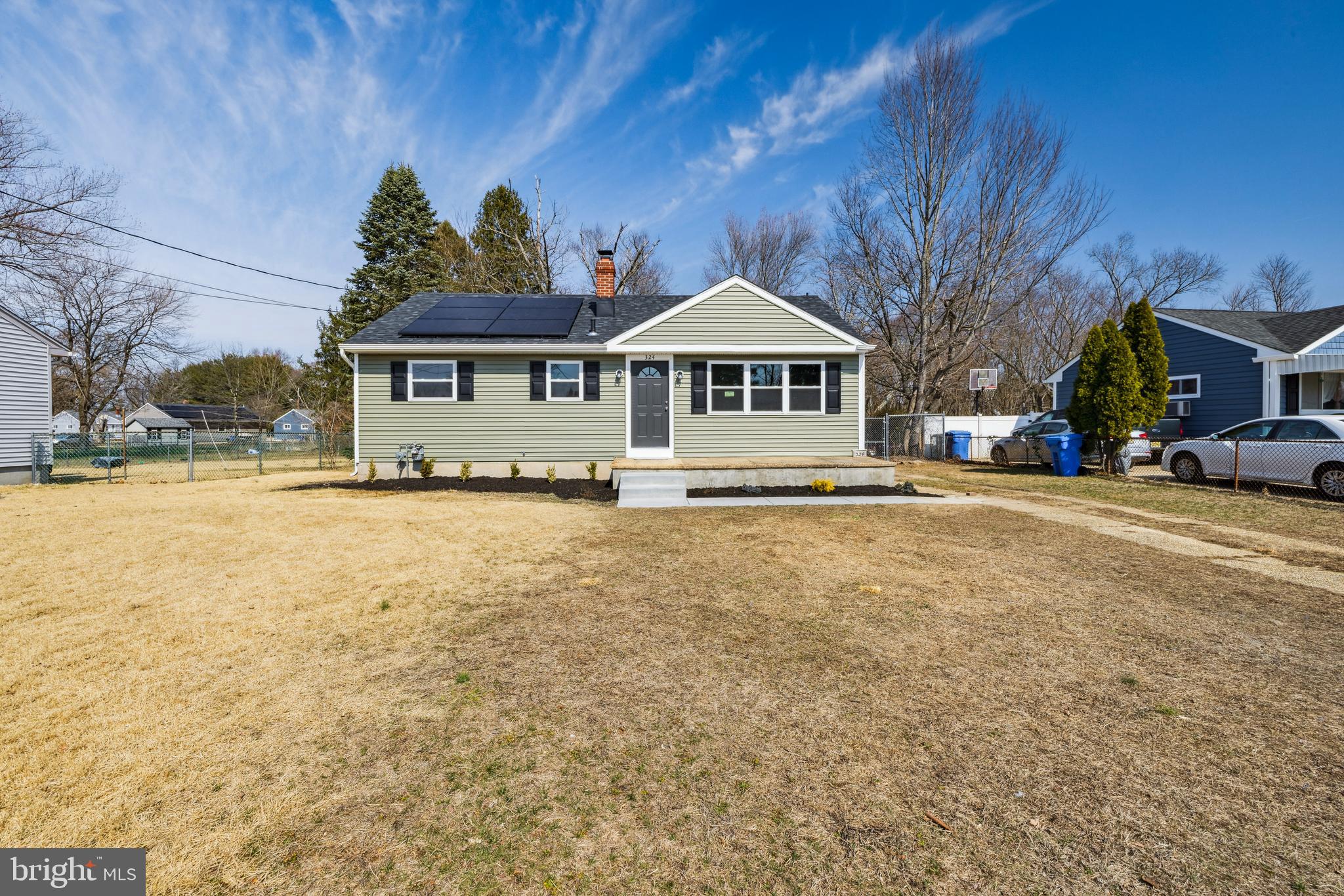 324 Baldwin Road Glassboro, NJ 08028 - Photo 1 of 14 a front view of a house with a yard