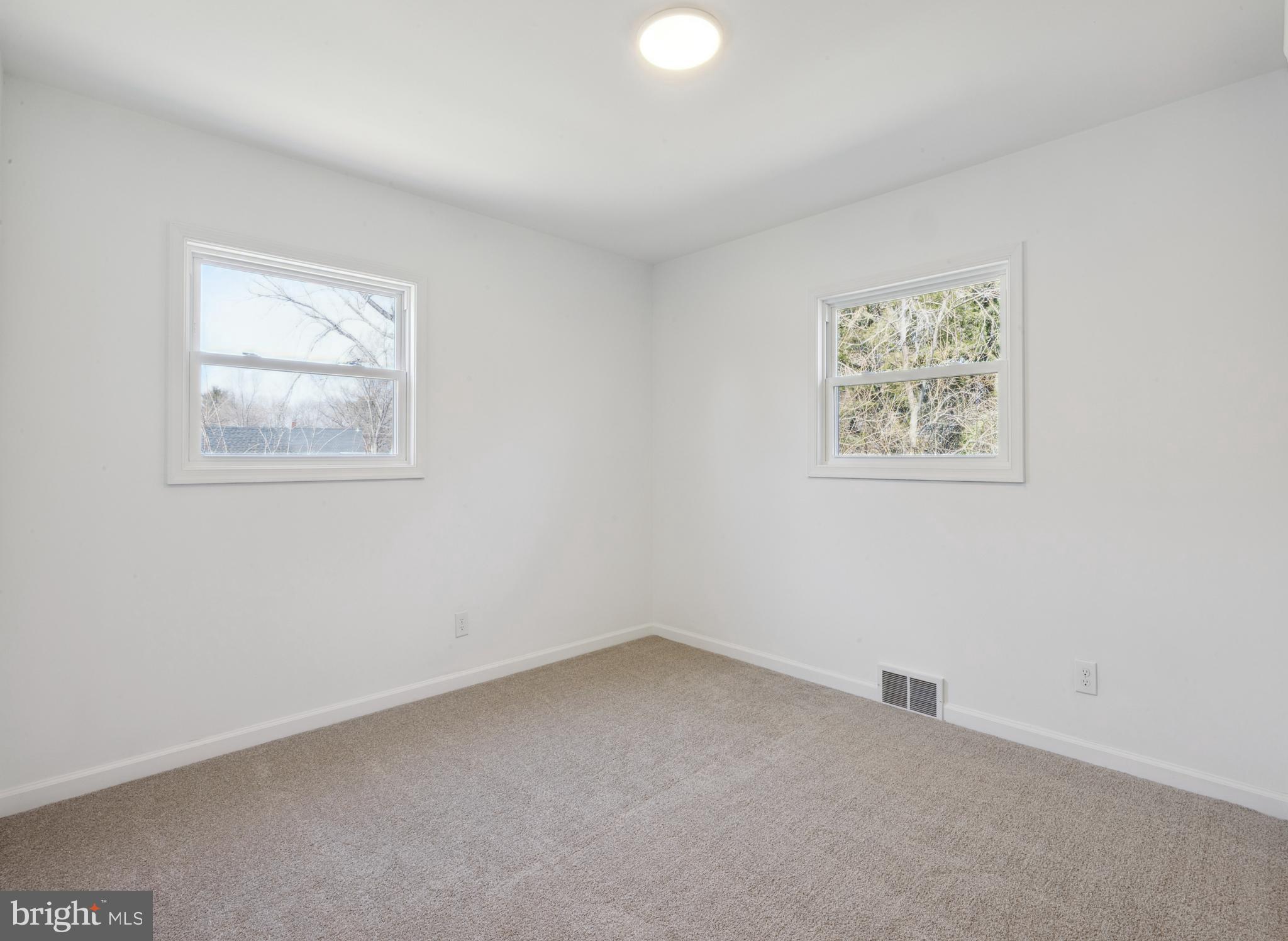 324 Baldwin Road Glassboro, NJ 08028 - Photo 10 of 14 an empty room with a window