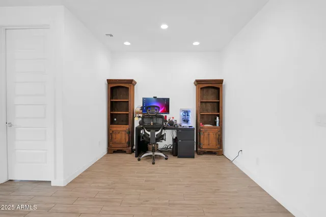 a view of livingroom with workspace