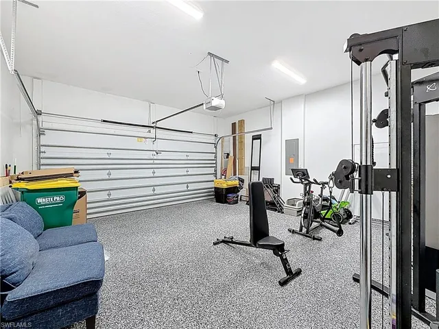 a view of a swimming pool with a lounge chairs