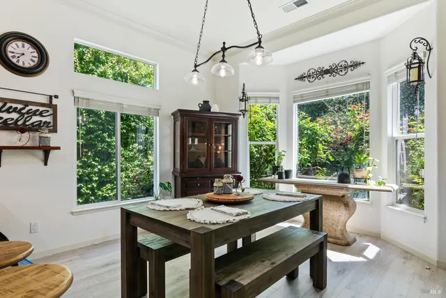 a bedroom with a bed a couch and dresser