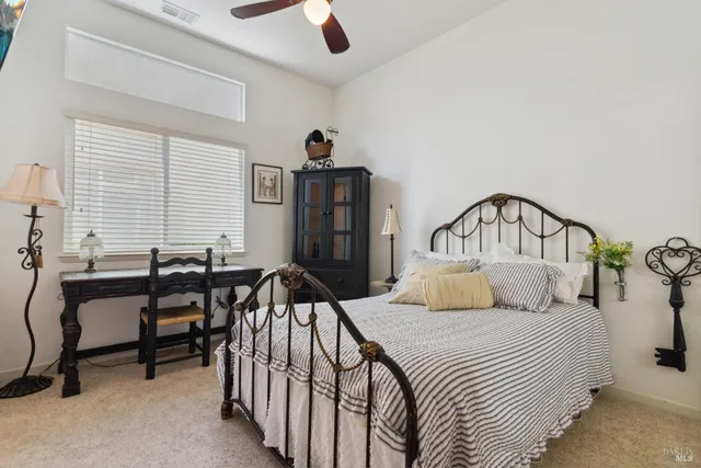 a bathroom with a sink mirror bathtub and toilet
