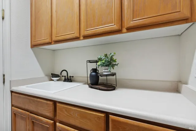 a view of a chairs and table in patio
