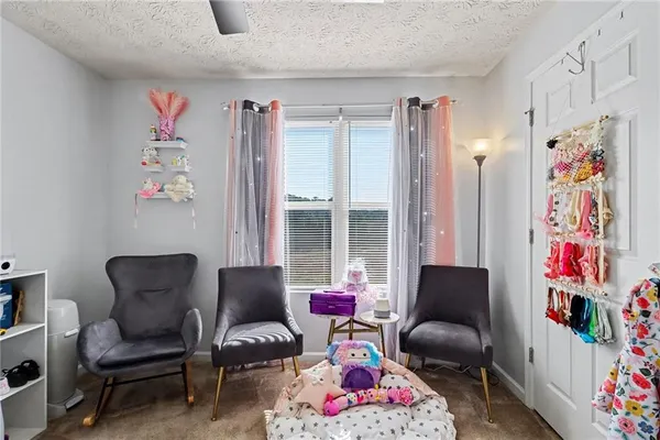 a living room with furniture and a couch