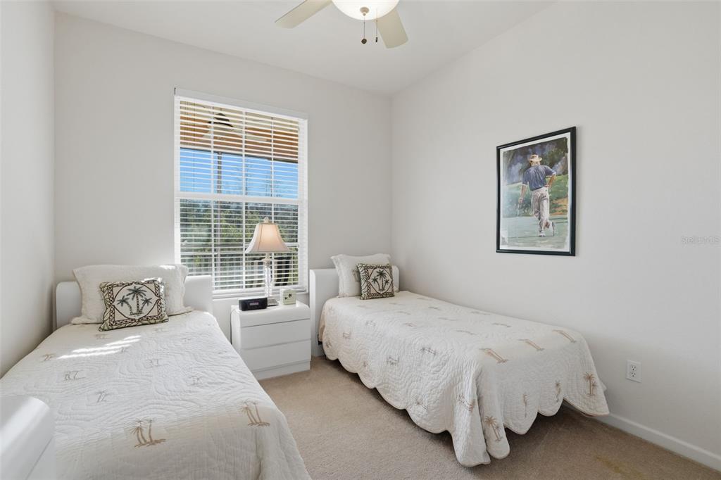 13560 Turtle Marsh Loop, Unit 336 Orlando, FL 32837 - Photo 18 of 38 a bedroom with a bed and a window
