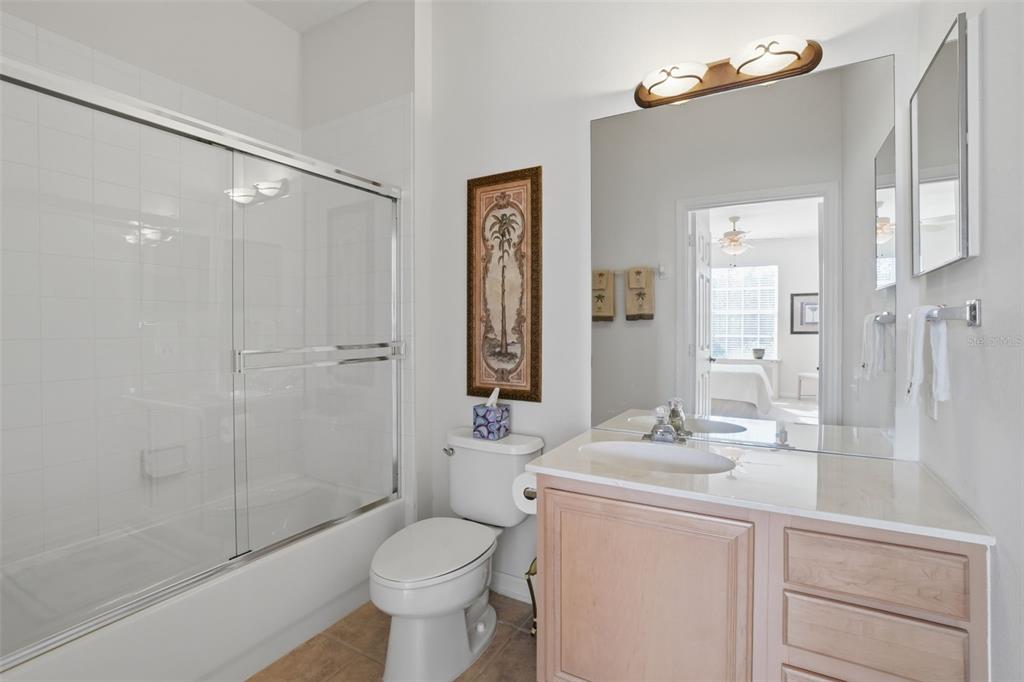 13560 Turtle Marsh Loop, Unit 336 Orlando, FL 32837 - Photo 23 of 38 a bathroom with a sink a toilet and shower