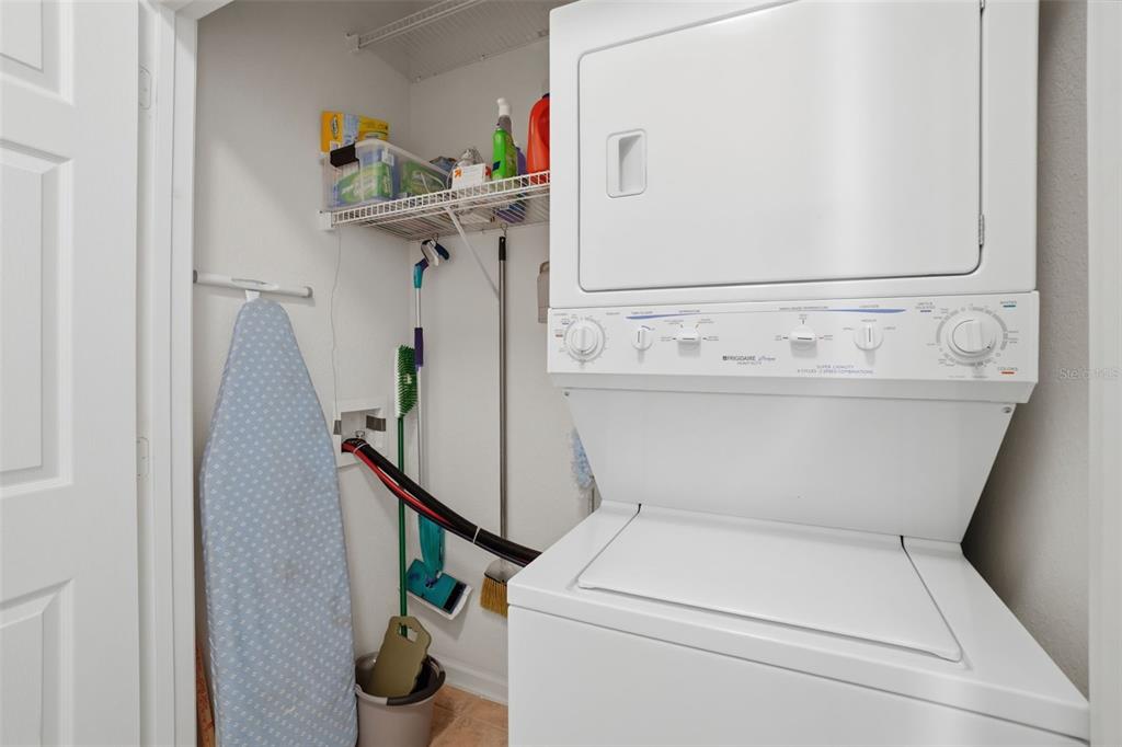 13560 Turtle Marsh Loop, Unit 336 Orlando, FL 32837 - Photo 24 of 38 a utility room with dryer and washer