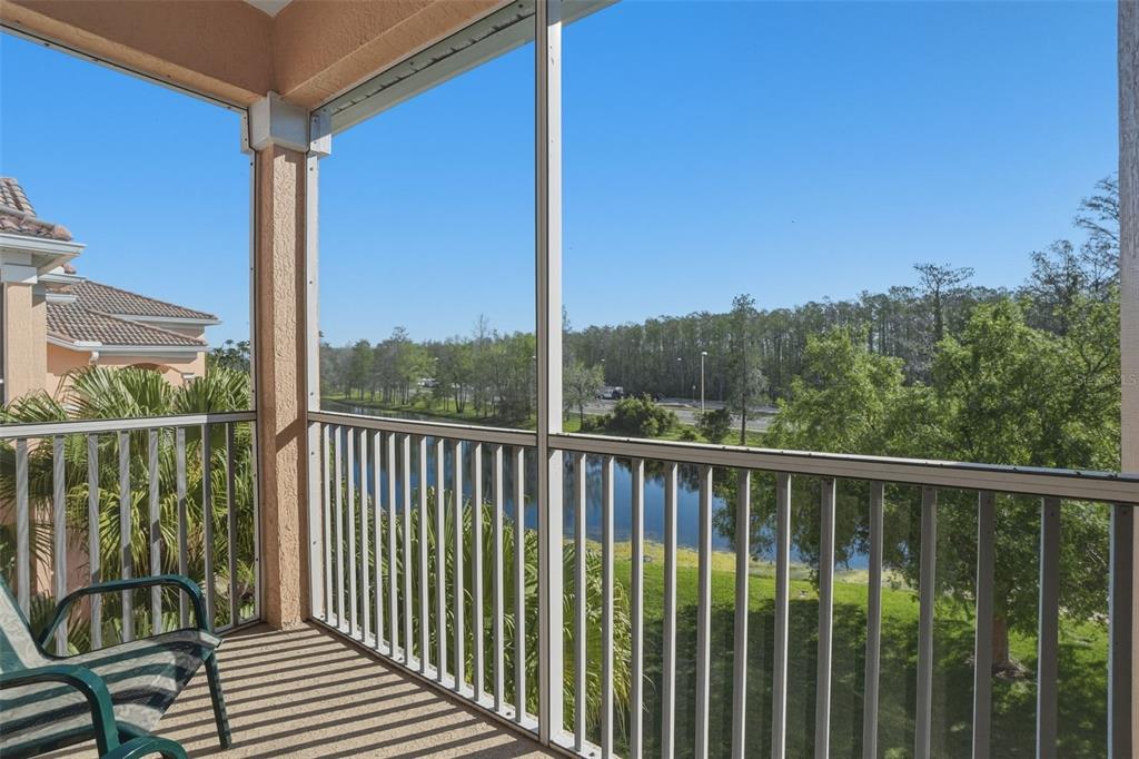13560 Turtle Marsh Loop, Unit 336 Orlando, FL 32837 - Photo 26 of 38 a view of a balcony with wooden floor