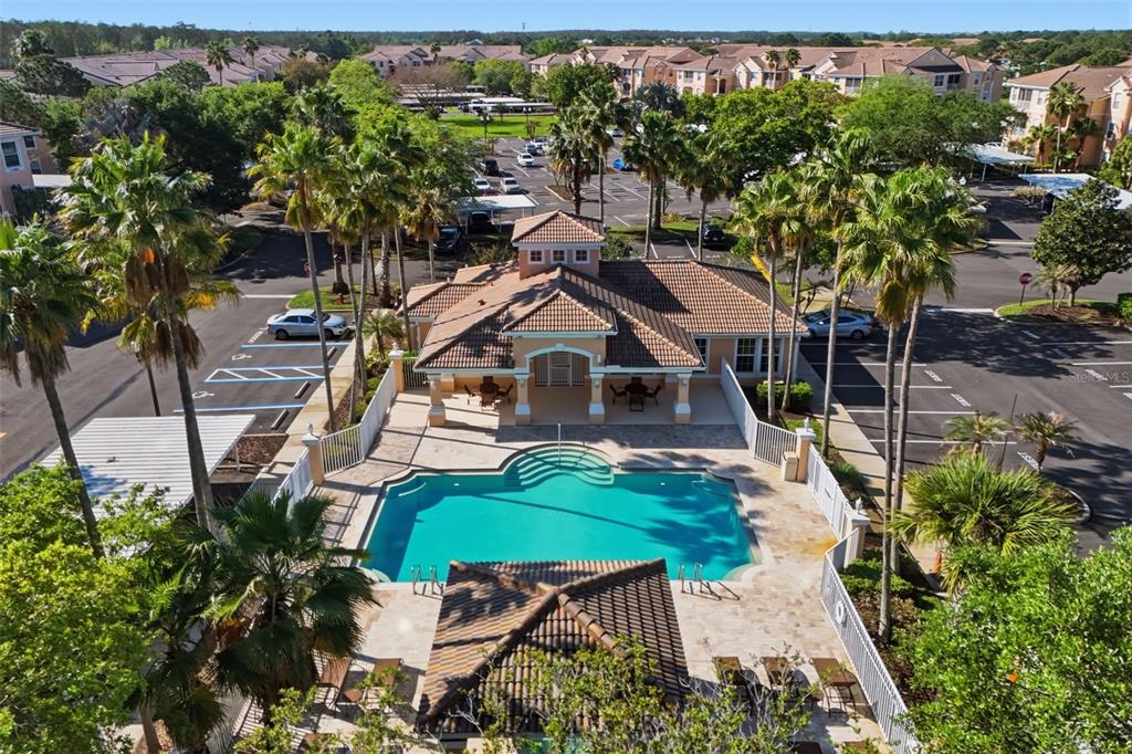 13560 Turtle Marsh Loop, Unit 336 Orlando, FL 32837 - Photo 27 of 38 an aerial view of a house with swimming pool patio and outdoor seating
