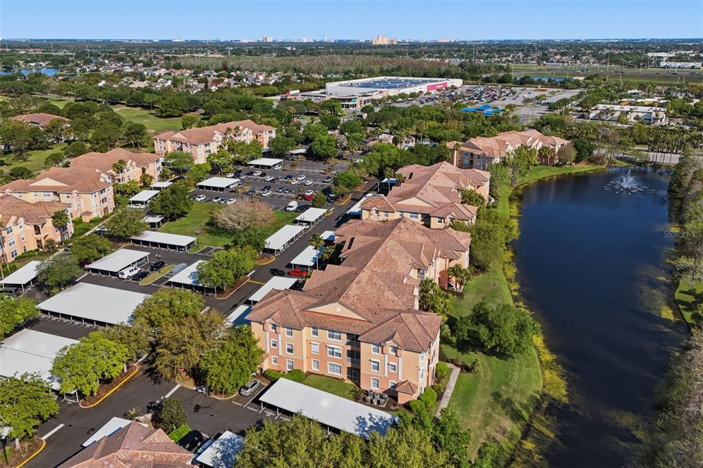 13560 Turtle Marsh Loop, Unit 336 Orlando, FL 32837 - Photo 28 of 38 an aerial view of a city with lots of residential buildings