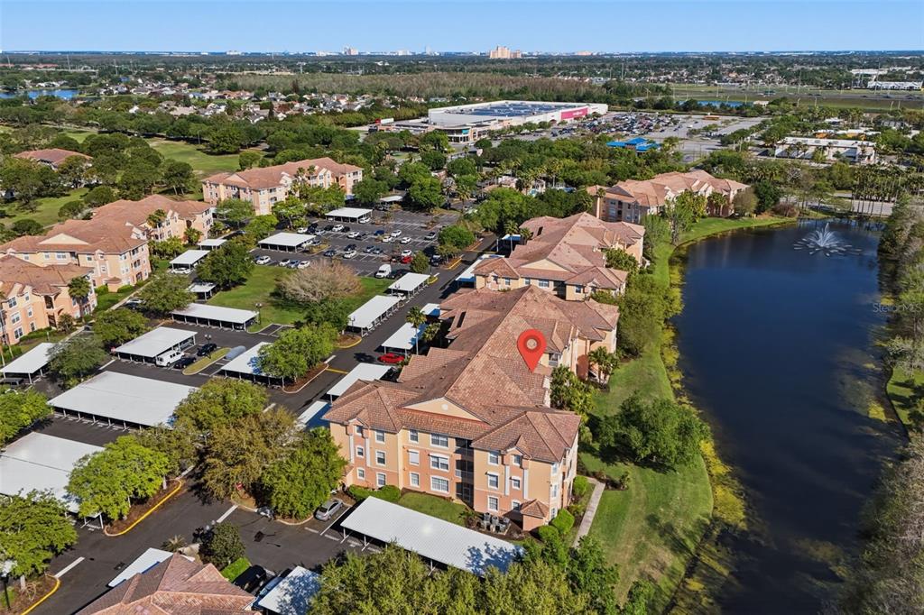 13560 Turtle Marsh Loop, Unit 336 Orlando, FL 32837 - Photo 29 of 38 an aerial view of a city with lots of residential buildings