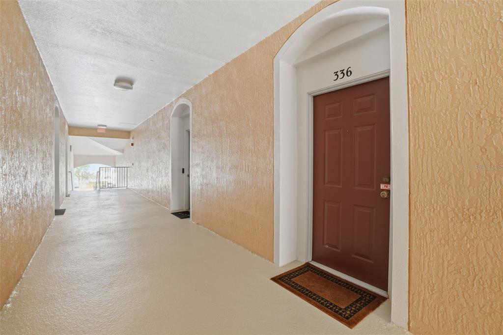 13560 Turtle Marsh Loop, Unit 336 Orlando, FL 32837 - Photo 3 of 38 a view of a hallway
