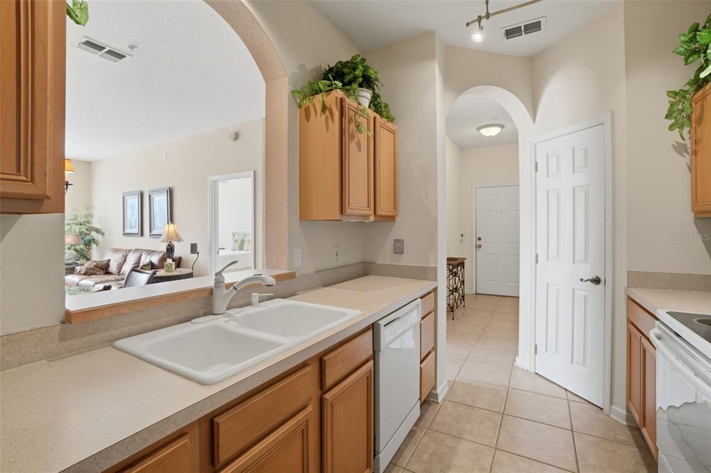 13560 Turtle Marsh Loop, Unit 336 Orlando, FL 32837 - Photo 10 of 38 a spacious bathroom with a sink double vanity