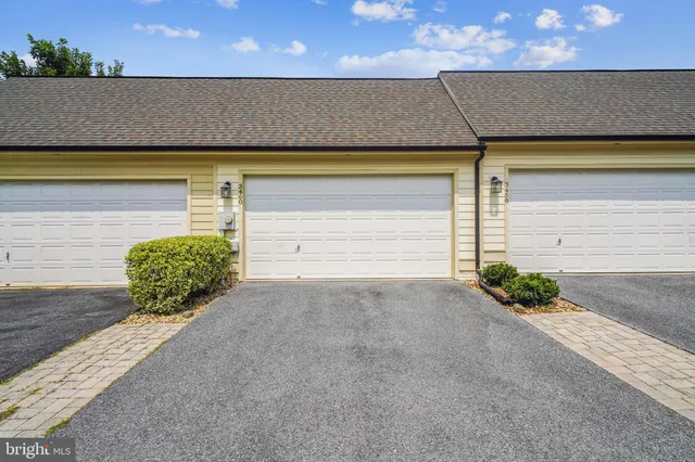 a view of a house with entertaining space and a park