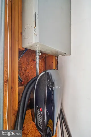 front view of a house with a tree