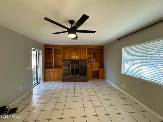 a view of an empty room and window