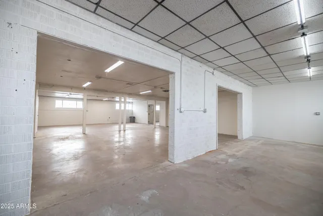 a view of a house with a snow in the yard