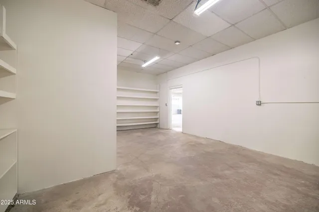 a view of a backyard of the house