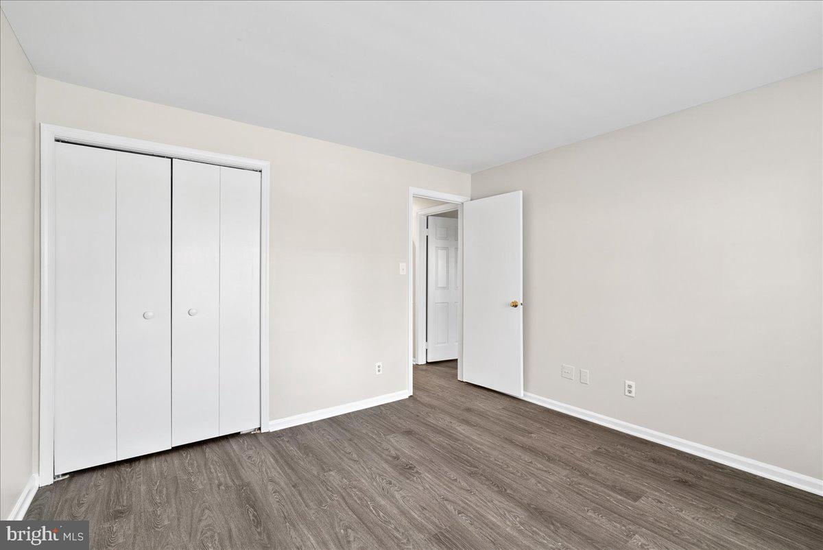 12942 A Grays Pointe Road, Unit 12942A Fairfax, VA 22033 - Photo 14 of 22 a view of an empty room with wooden floor