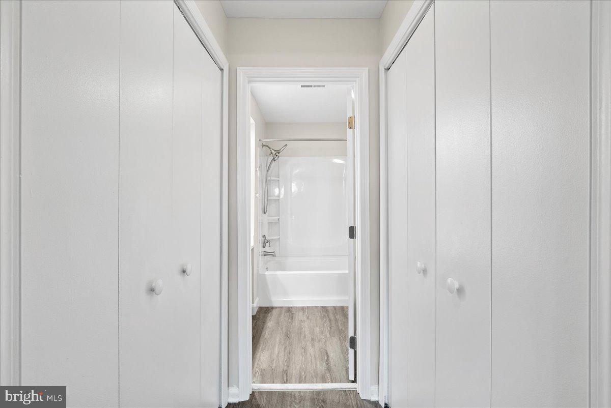 12942 A Grays Pointe Road, Unit 12942A Fairfax, VA 22033 - Photo 17 of 22 a view of a bathroom with a glass door