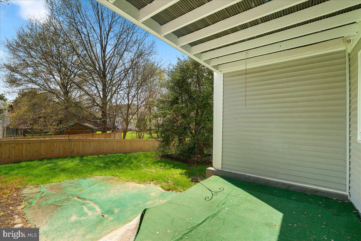 12942 A Grays Pointe Road, Unit 12942A Fairfax, VA 22033 - Photo 19 of 22 a view of backyard with green space