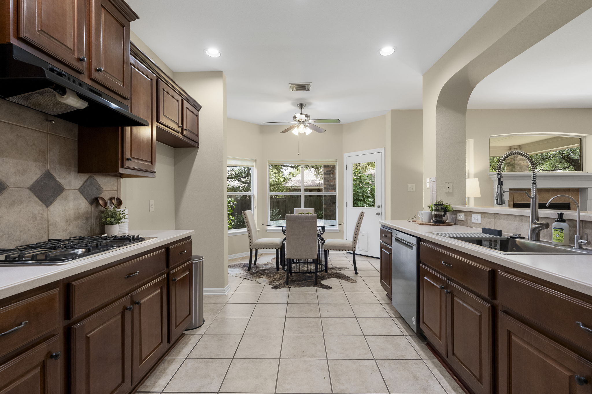 1822 Nelson Ranch Loop Cedar Park, TX 78613 - Photo 16 of 40 The functional layout offers plenty of workspace with cabinetry lining both sides of the kitchen.
