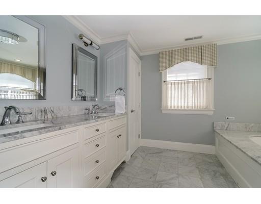 25 Kenilworth Road Wellesley, MA 02482 - Photo 14 of 28 a bathroom with double sink and a mirror