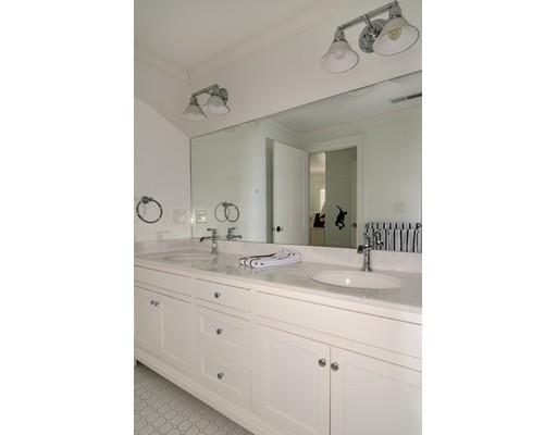 25 Kenilworth Road Wellesley, MA 02482 - Photo 21 of 28 a bathroom with a sink and a mirror