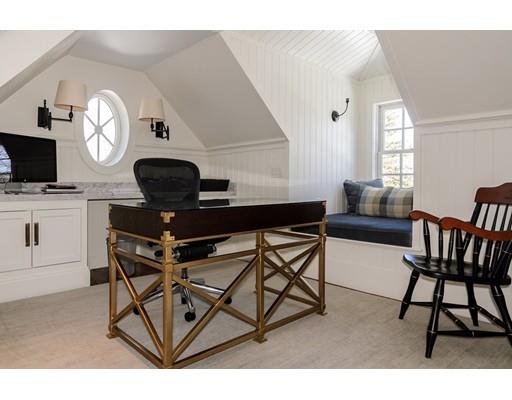 25 Kenilworth Road Wellesley, MA 02482 - Photo 23 of 28 a living room with furniture and a flat screen tv