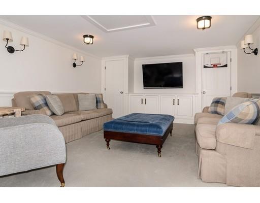 25 Kenilworth Road Wellesley, MA 02482 - Photo 24 of 28 a living room with furniture and a flat screen tv