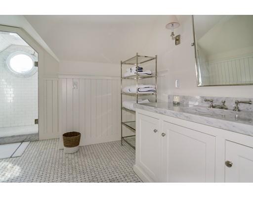 25 Kenilworth Road Wellesley, MA 02482 - Photo 26 of 28 a bathroom with a sink and a mirror
