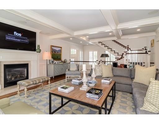 25 Kenilworth Road Wellesley, MA 02482 - Photo 5 of 28 a living room with furniture kitchen view and a fireplace