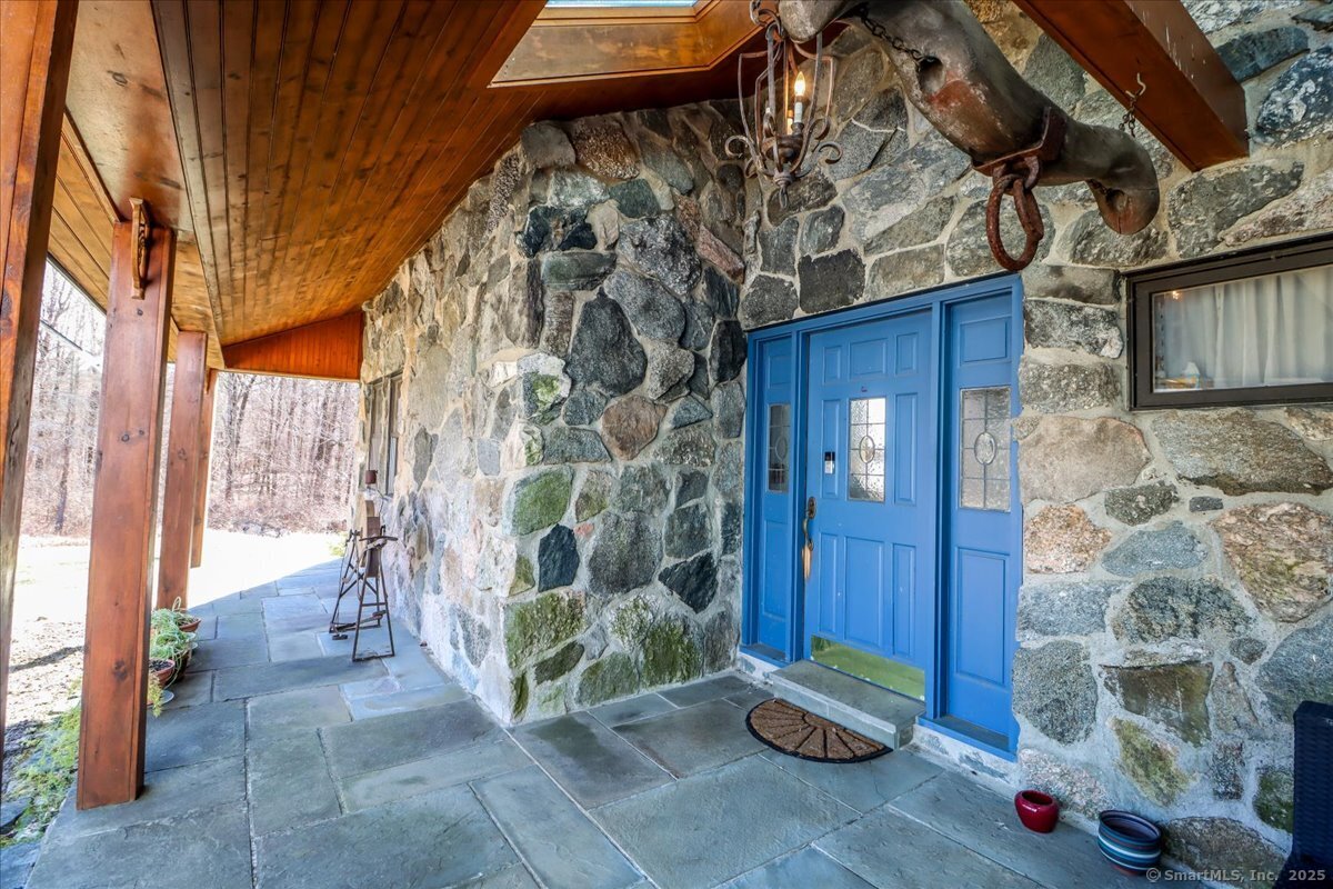 Amazing fieldstone entry and sitting area!