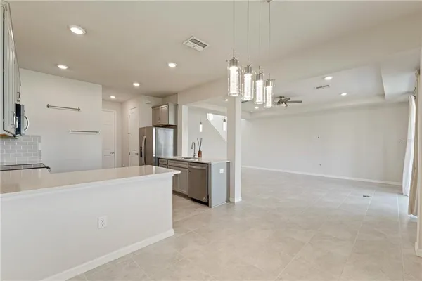 a kitchen with sink and window