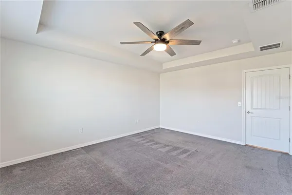 a bathroom with a shower and a toilet