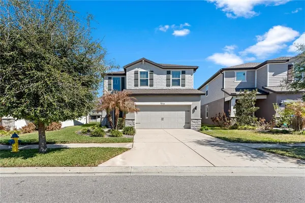 a front view of house with yard