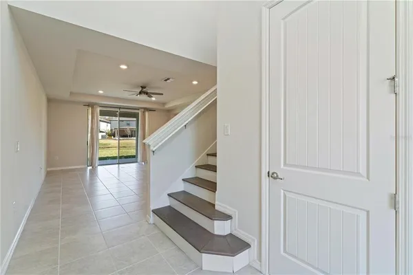 a view of a livingroom with a staircase