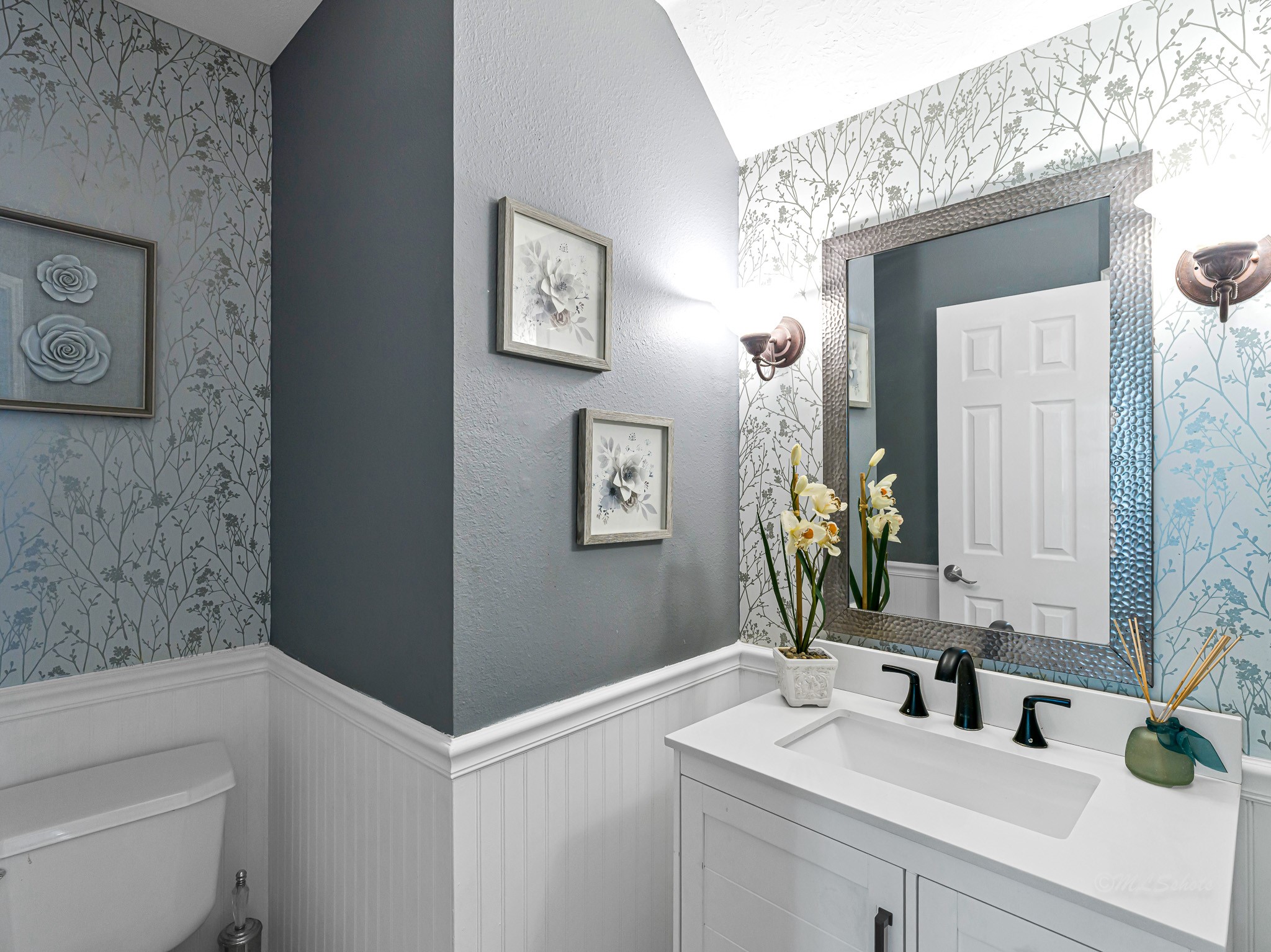 6822 Eagle Ridge Drive Katy, TX 77449 - Photo 12 of 36 a bathroom with a sink a toilet and mirror
