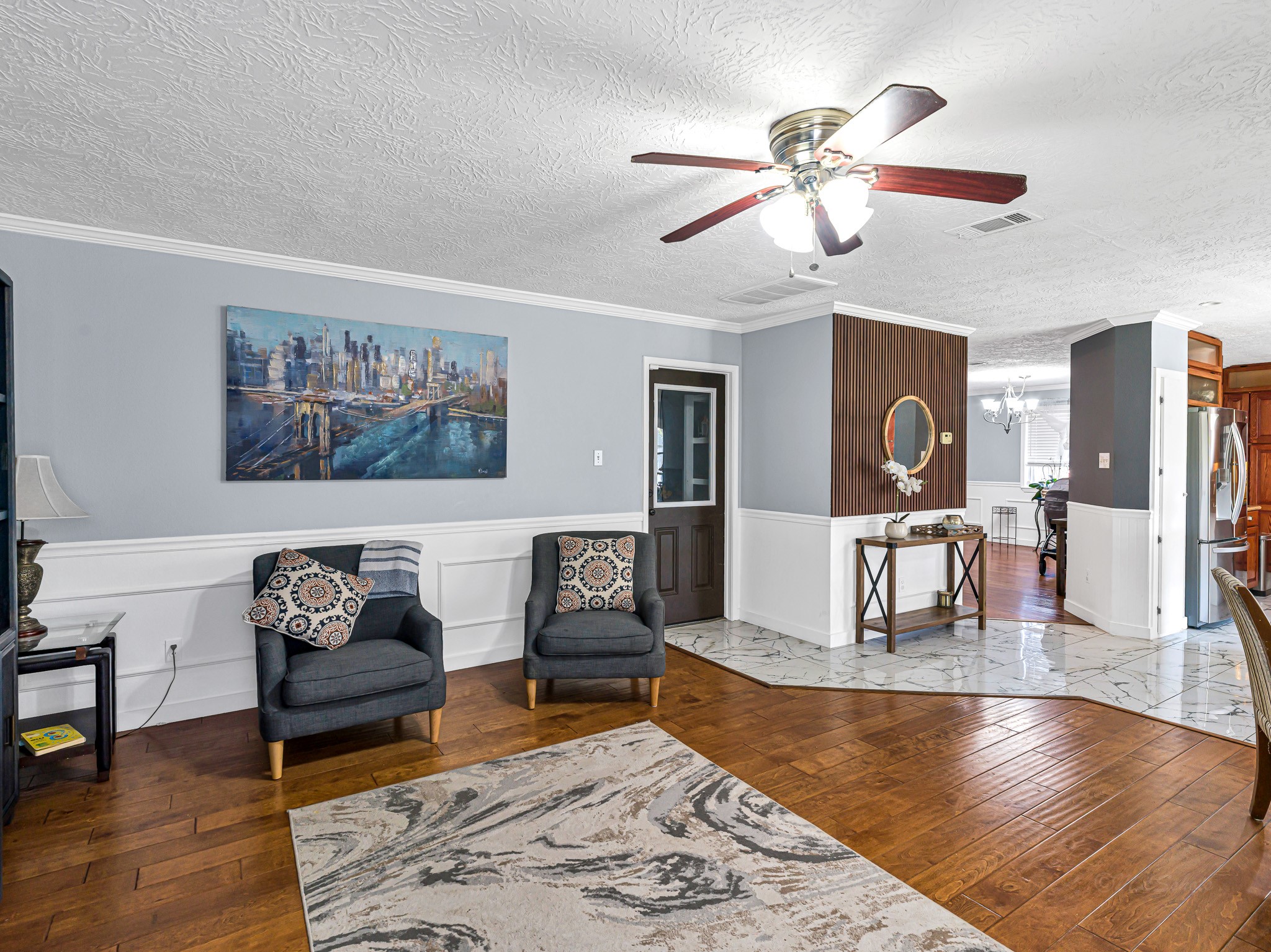 6822 Eagle Ridge Drive Katy, TX 77449 - Photo 14 of 36 a living room with furniture and a dining table with wooden floor