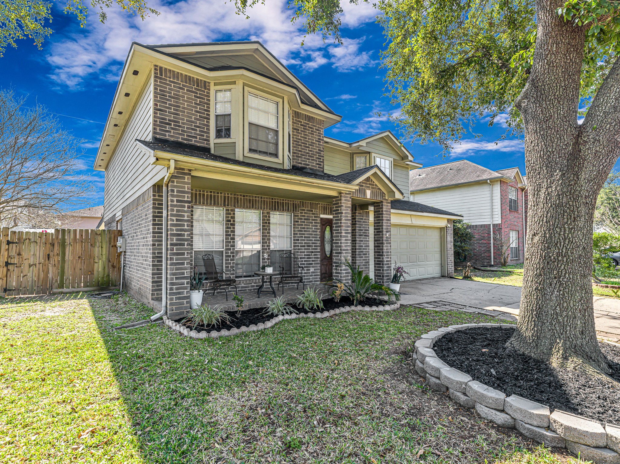 6822 Eagle Ridge Drive Katy, TX 77449 - Photo 2 of 36 a front view of a house with a yard