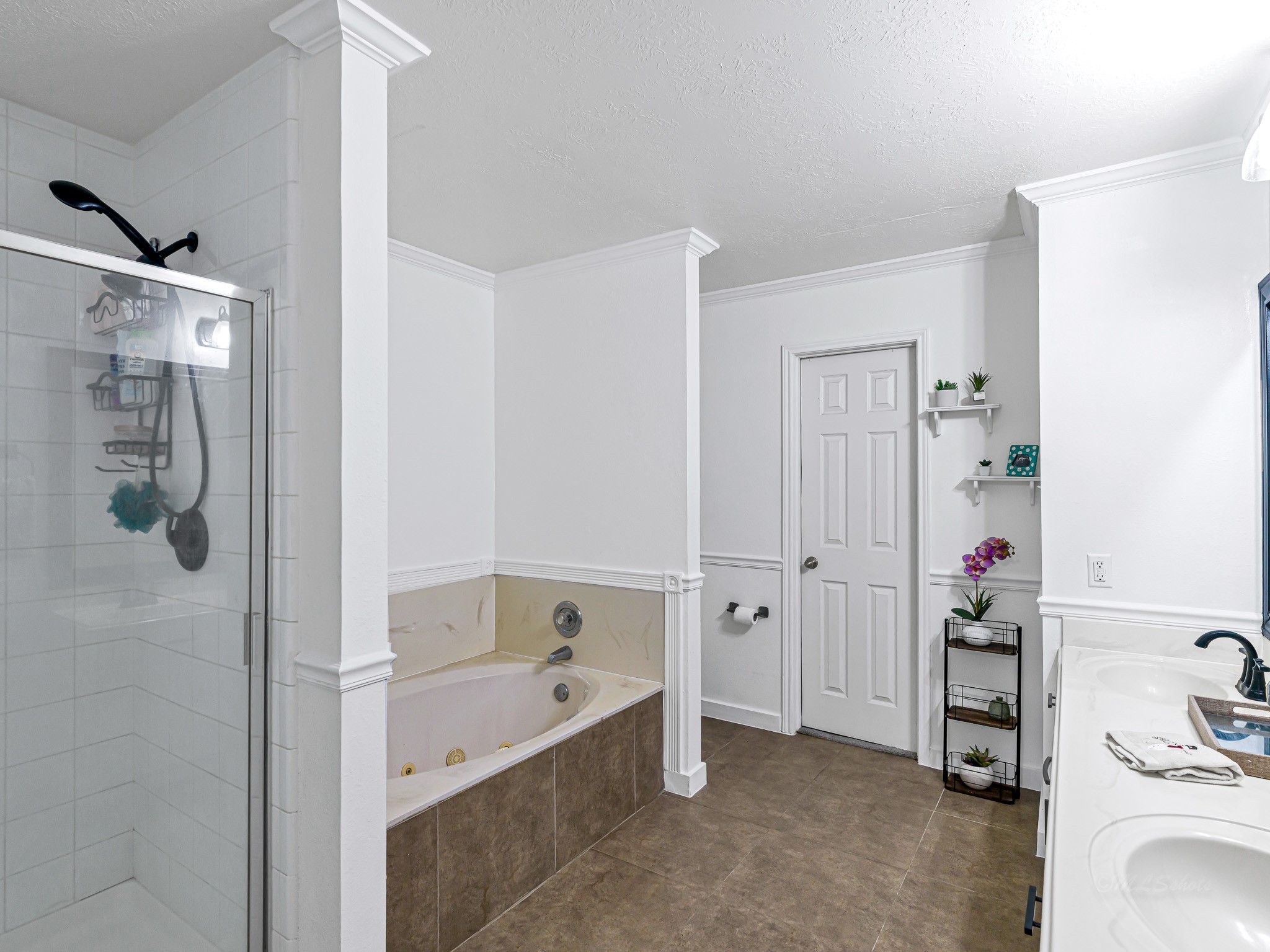 6822 Eagle Ridge Drive Katy, TX 77449 - Photo 23 of 36 a bathroom with a tub and a shower