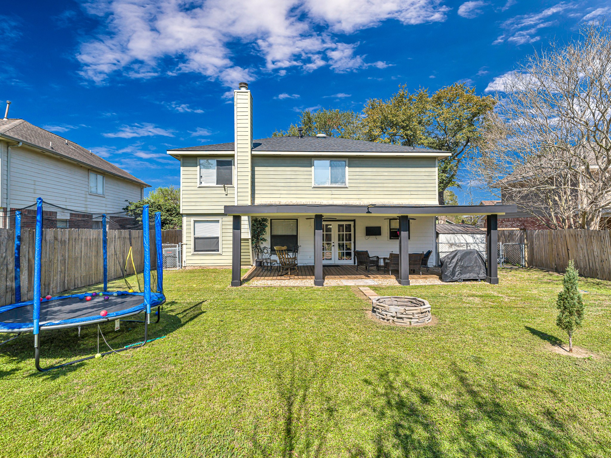 6822 Eagle Ridge Drive Katy, TX 77449 - Photo 33 of 36 a view of a house with swimming pool and porch