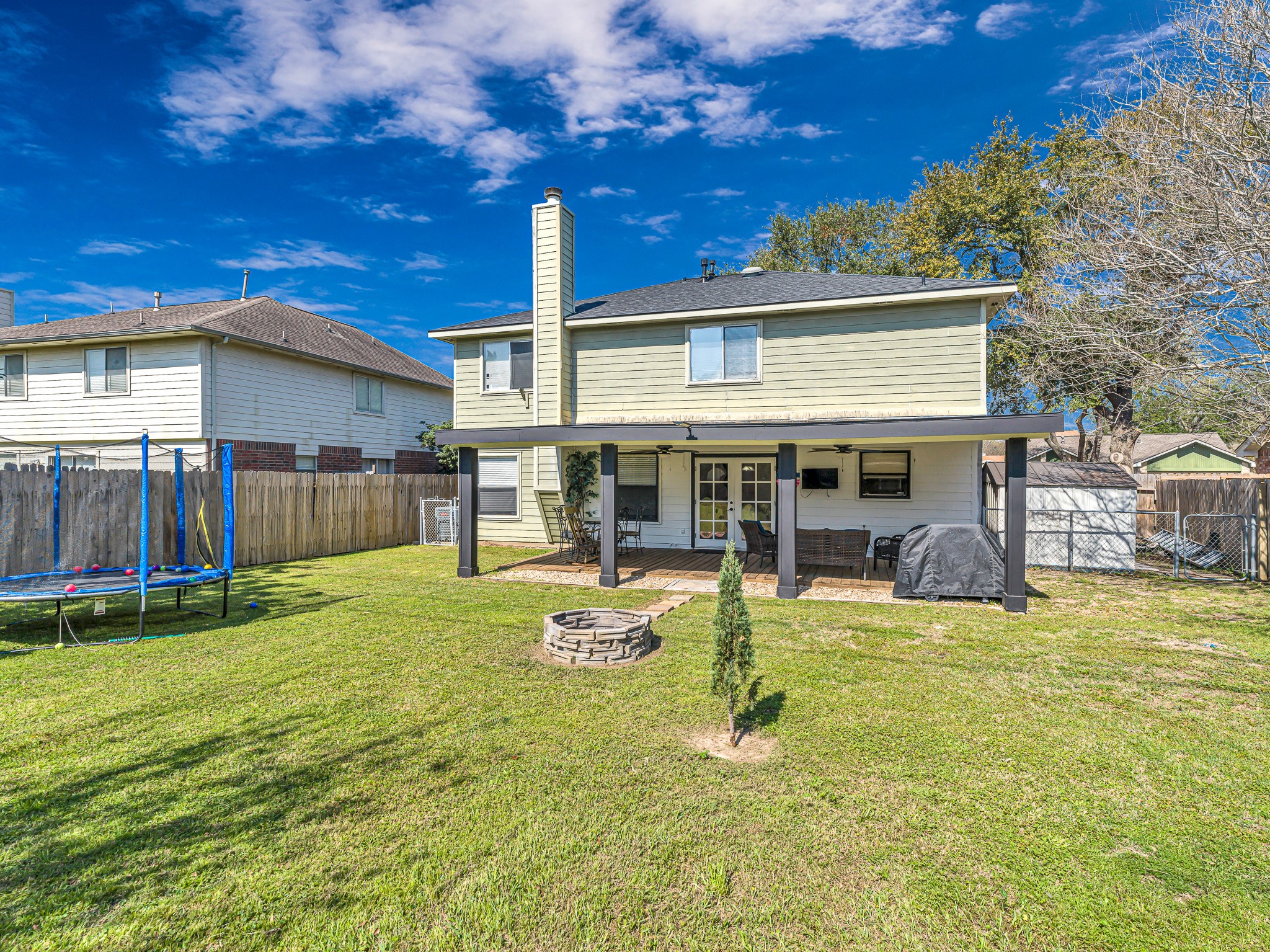 6822 Eagle Ridge Drive Katy, TX 77449 - Photo 34 of 36 a view of a house with swimming pool and a yard