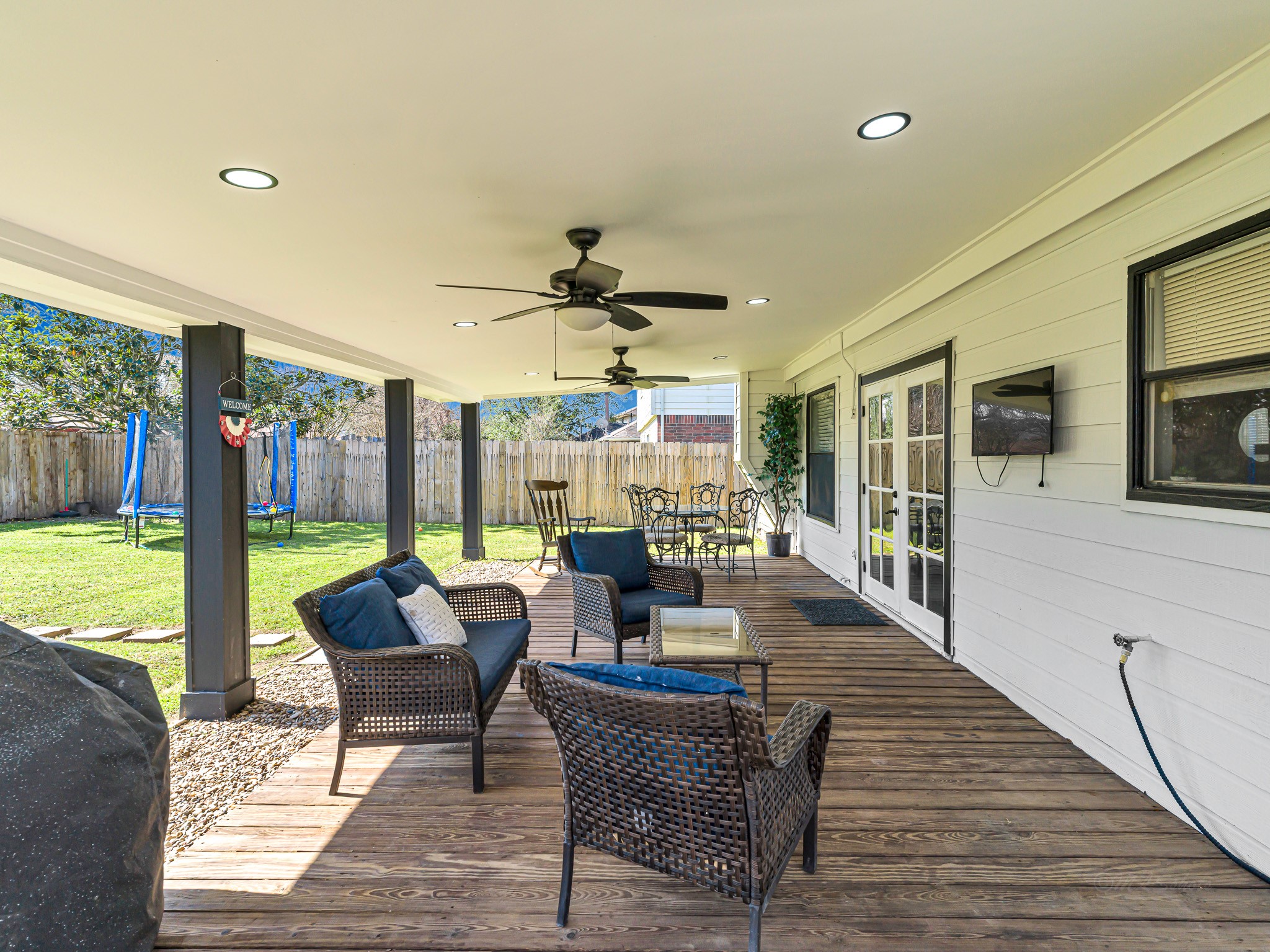 6822 Eagle Ridge Drive Katy, TX 77449 - Photo 36 of 36 a living room with furniture and a floor to ceiling window