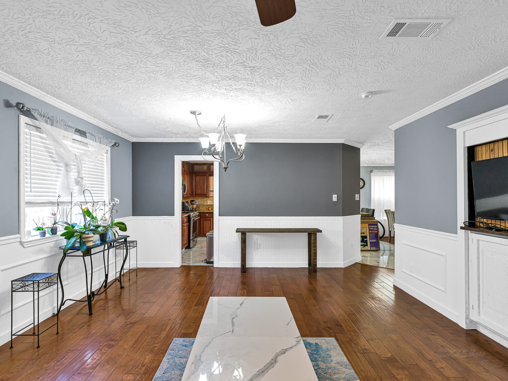 6822 Eagle Ridge Drive Katy, TX 77449 - Photo 9 of 36 a living room with furniture and a flat screen tv