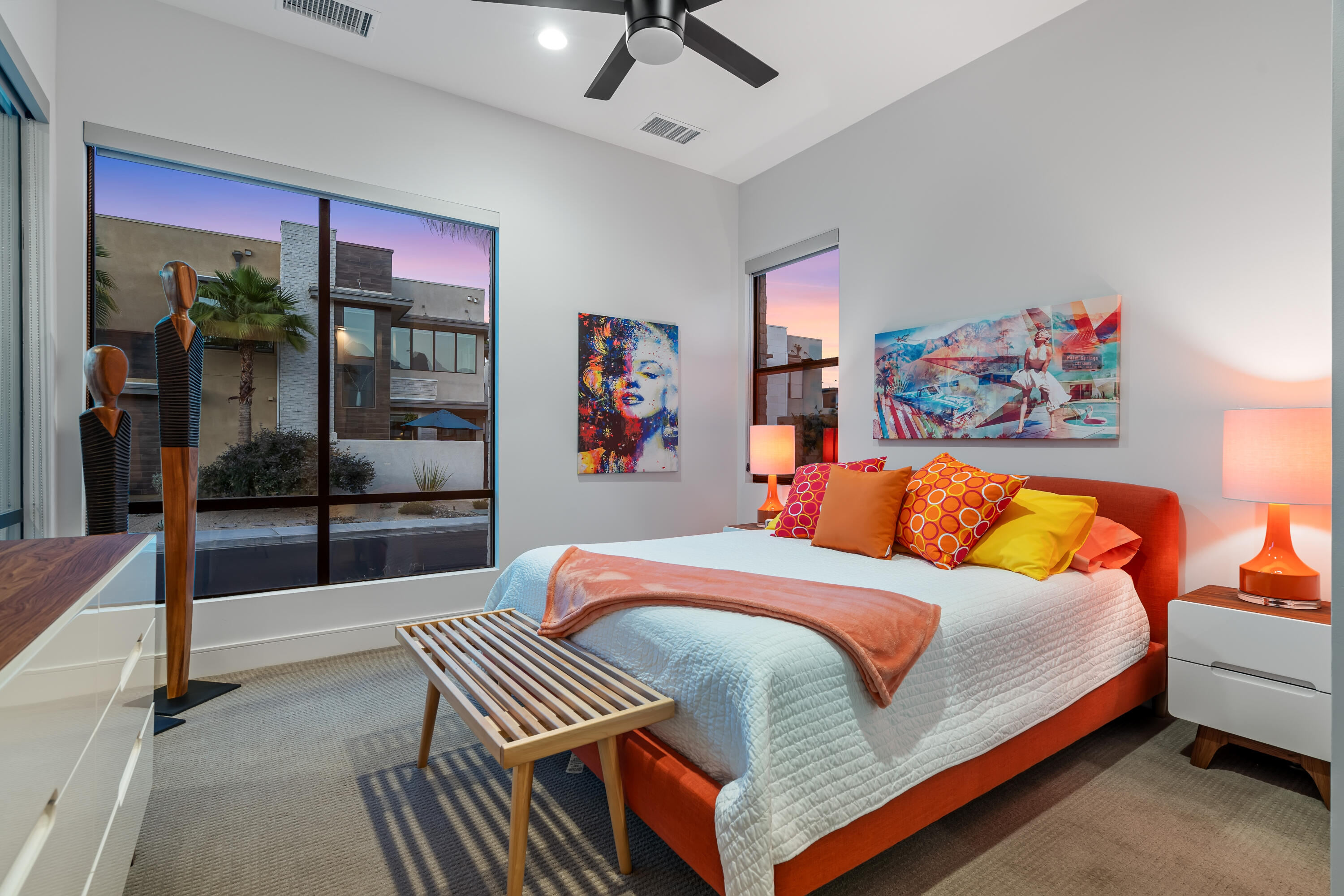 175 Vibe Way Palm Springs, CA 92262 - Photo 20 of 42 a bedroom with a bed and a chandelier