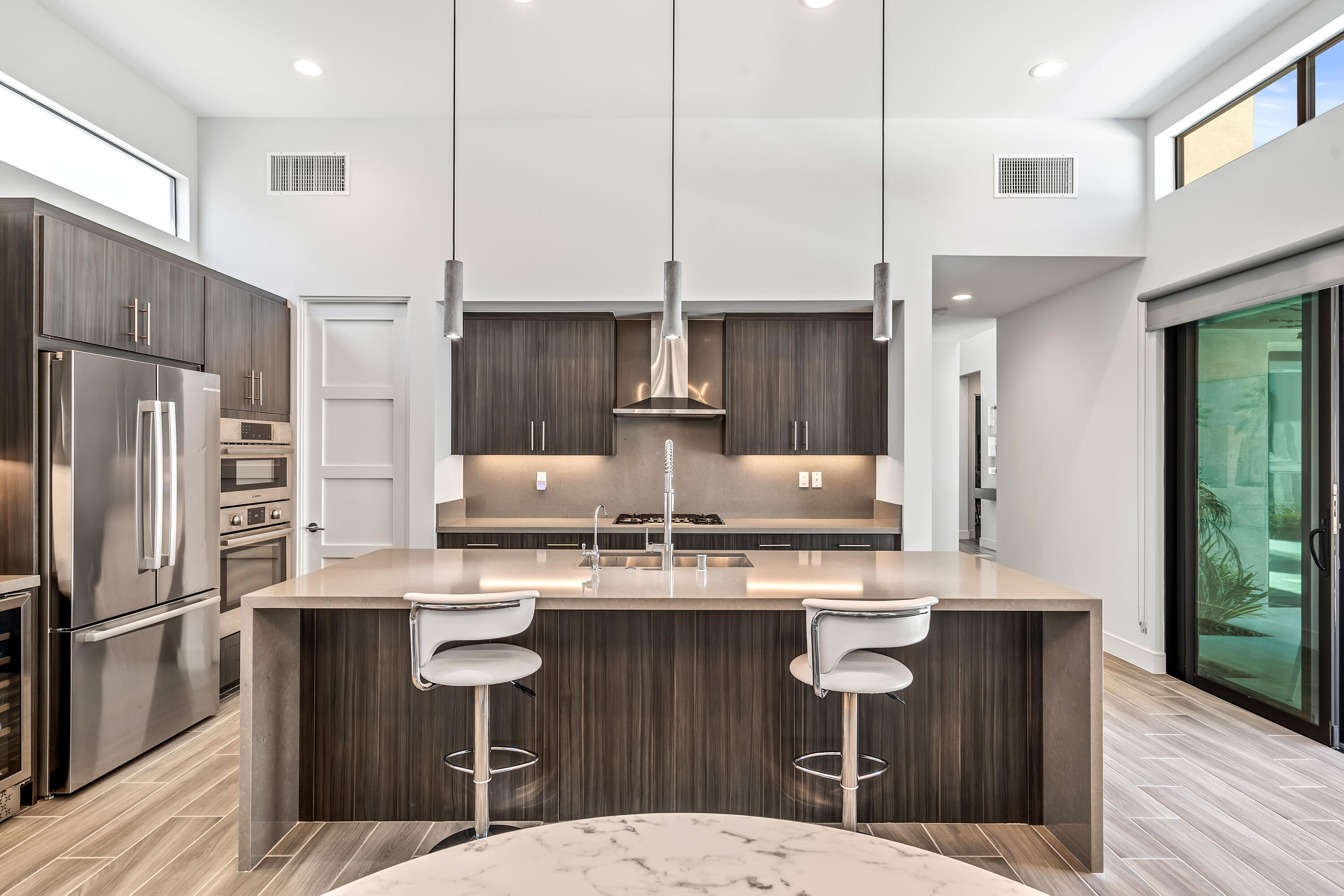 175 Vibe Way Palm Springs, CA 92262 - Photo 10 of 42 a kitchen with stainless steel appliances granite countertop a sink refrigerator and cabinets