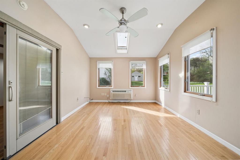 446 Diablo Drive Pittsburgh, PA 15241 - Photo 18 of 39 a view of an empty room with a window and wooden floor