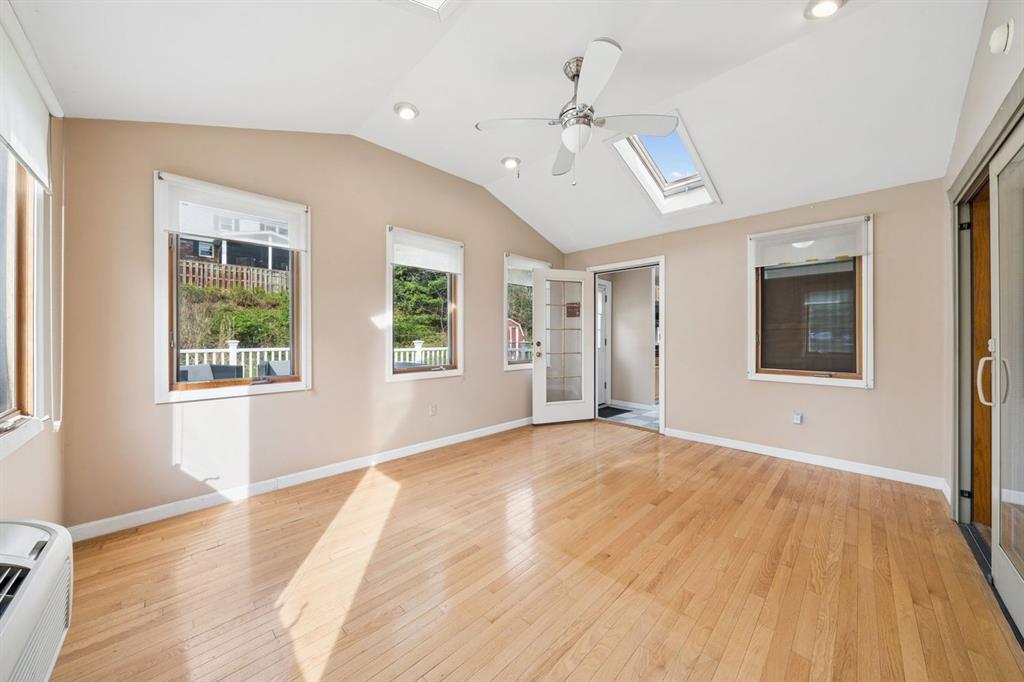 446 Diablo Drive Pittsburgh, PA 15241 - Photo 19 of 39 a view of an empty room with wooden floor and a window